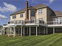 <b>TimberTech Reserve Dark Roast composite decking with White Washington Vinyl Railing with square black aluminum balusters</b>